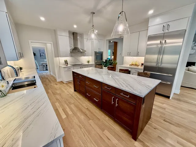 a dining room with table or chairs and a wooden floor