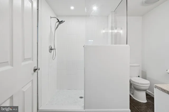 a bathroom with a bathtub and a shower curtain