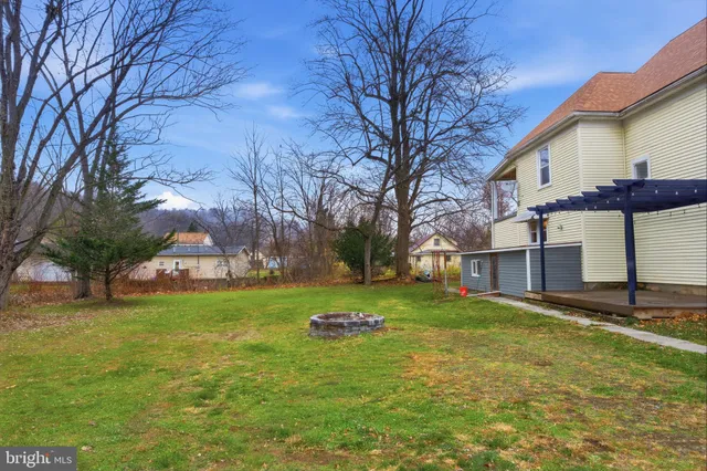 a view of a trees in front of a house