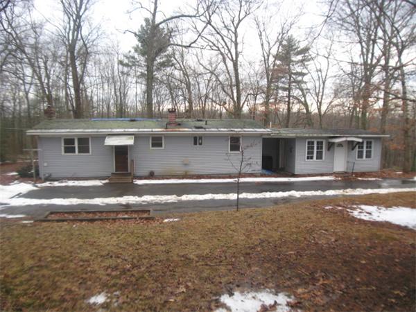 30 Rice Corner Road Brookfield, MA 01506 - Photo 1 of 1 a backyard of a house with barbeque oven table and chairs