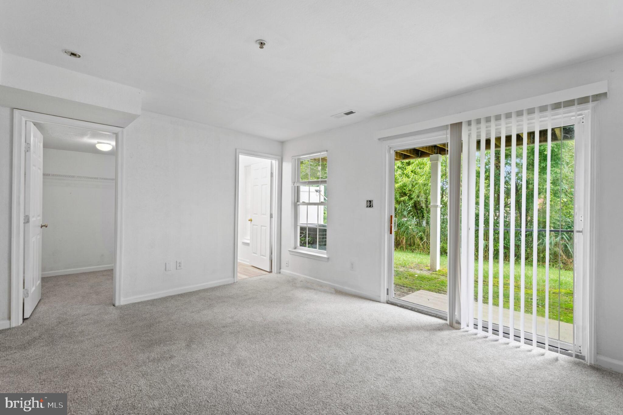 29 Pier Point Drive Millville, DE 19967 - Photo 11 of 36 a view of a room with large windows