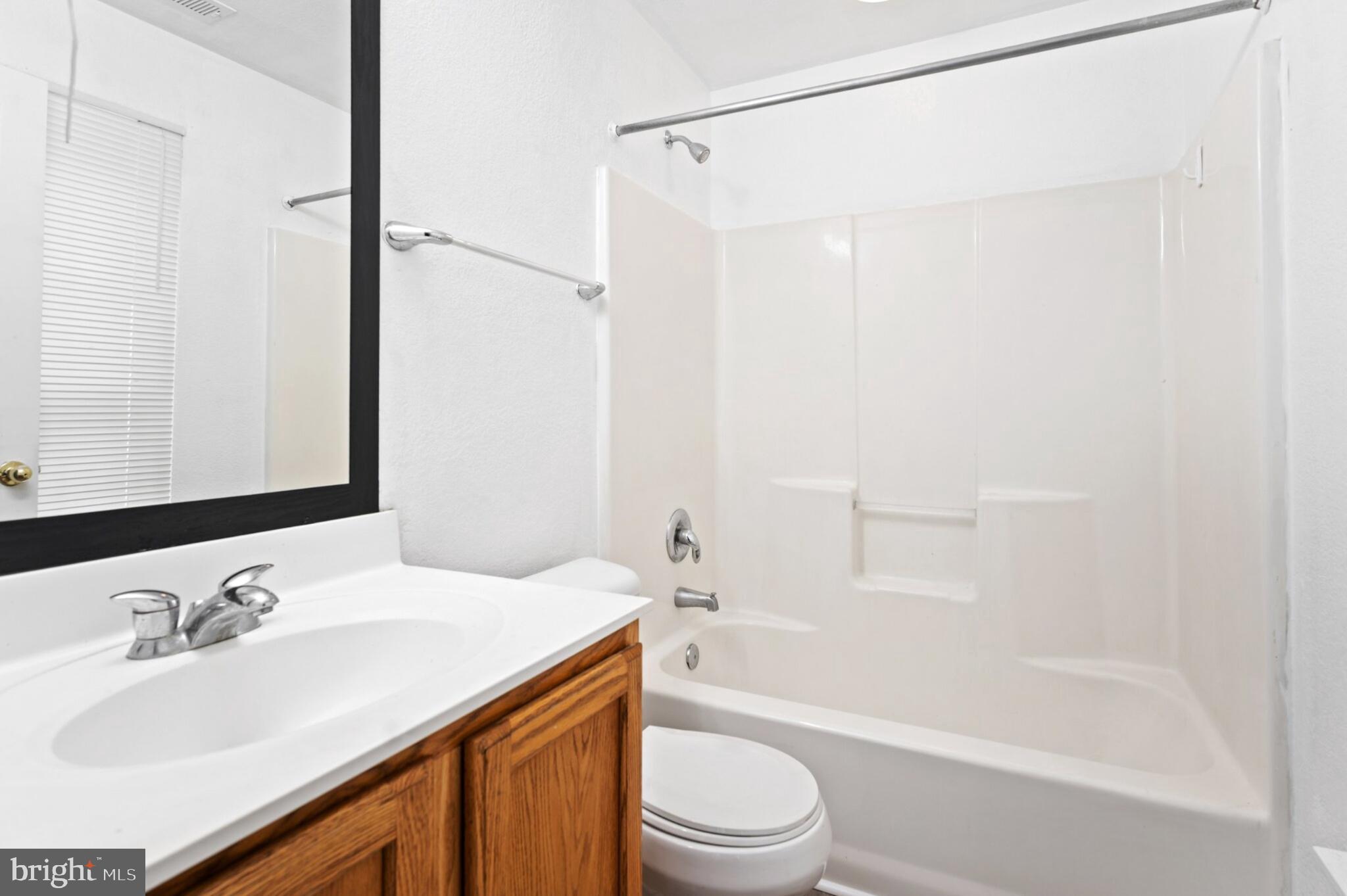 29 Pier Point Drive Millville, DE 19967 - Photo 12 of 36 a bathroom with a sink toilet and shower