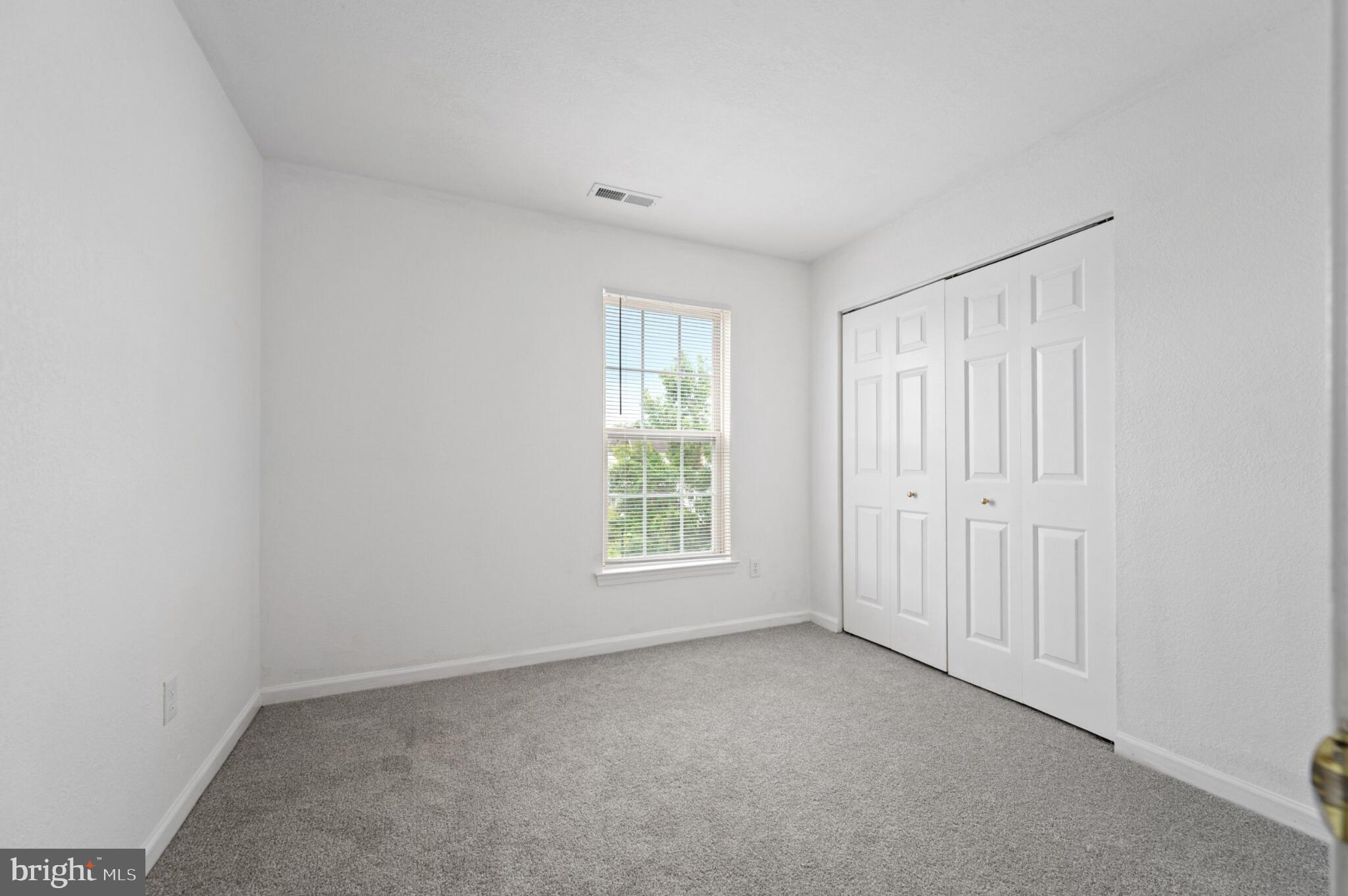 29 Pier Point Drive Millville, DE 19967 - Photo 22 of 36 an empty room with windows