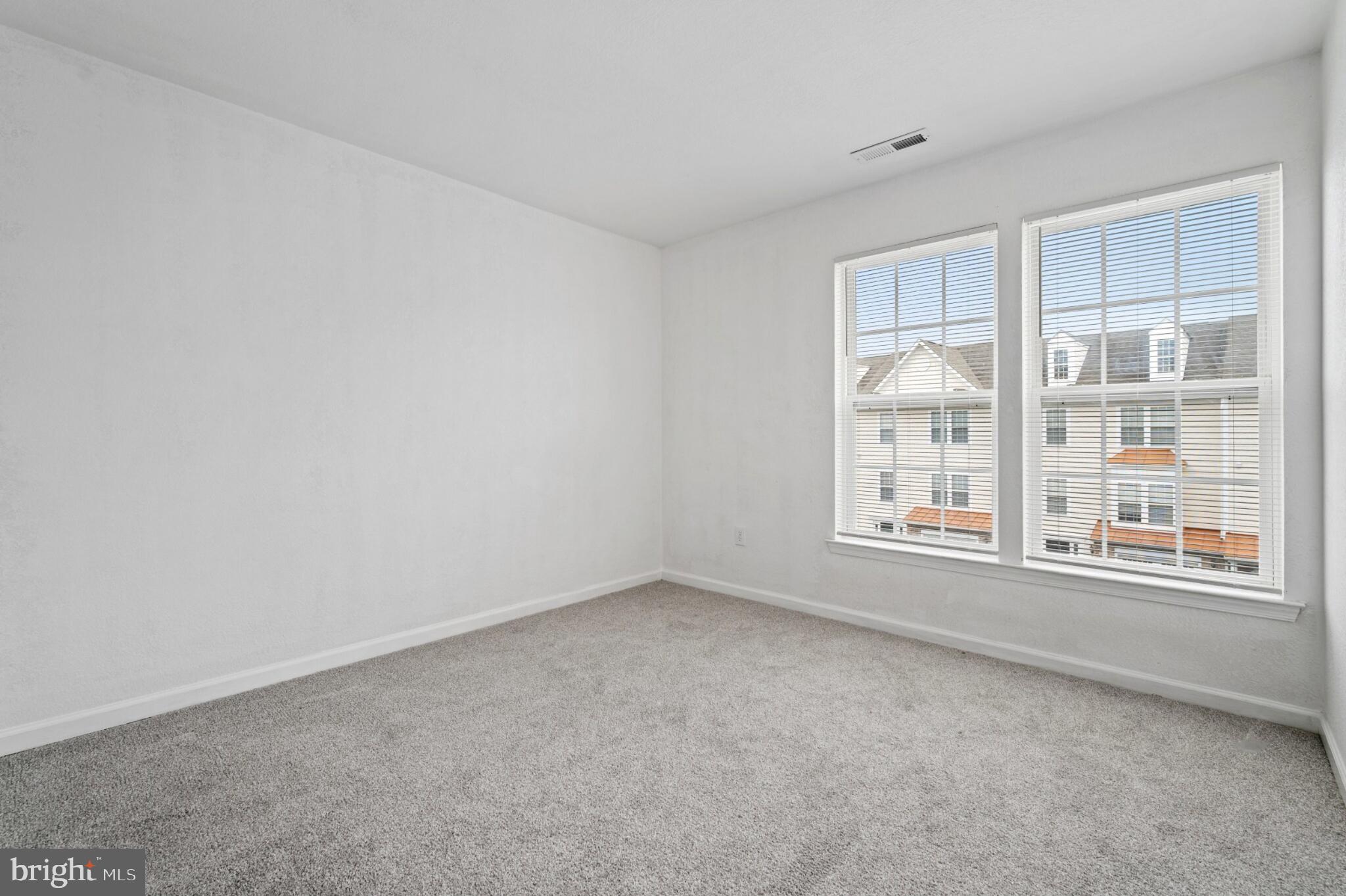 29 Pier Point Drive Millville, DE 19967 - Photo 23 of 36 an empty room with a window