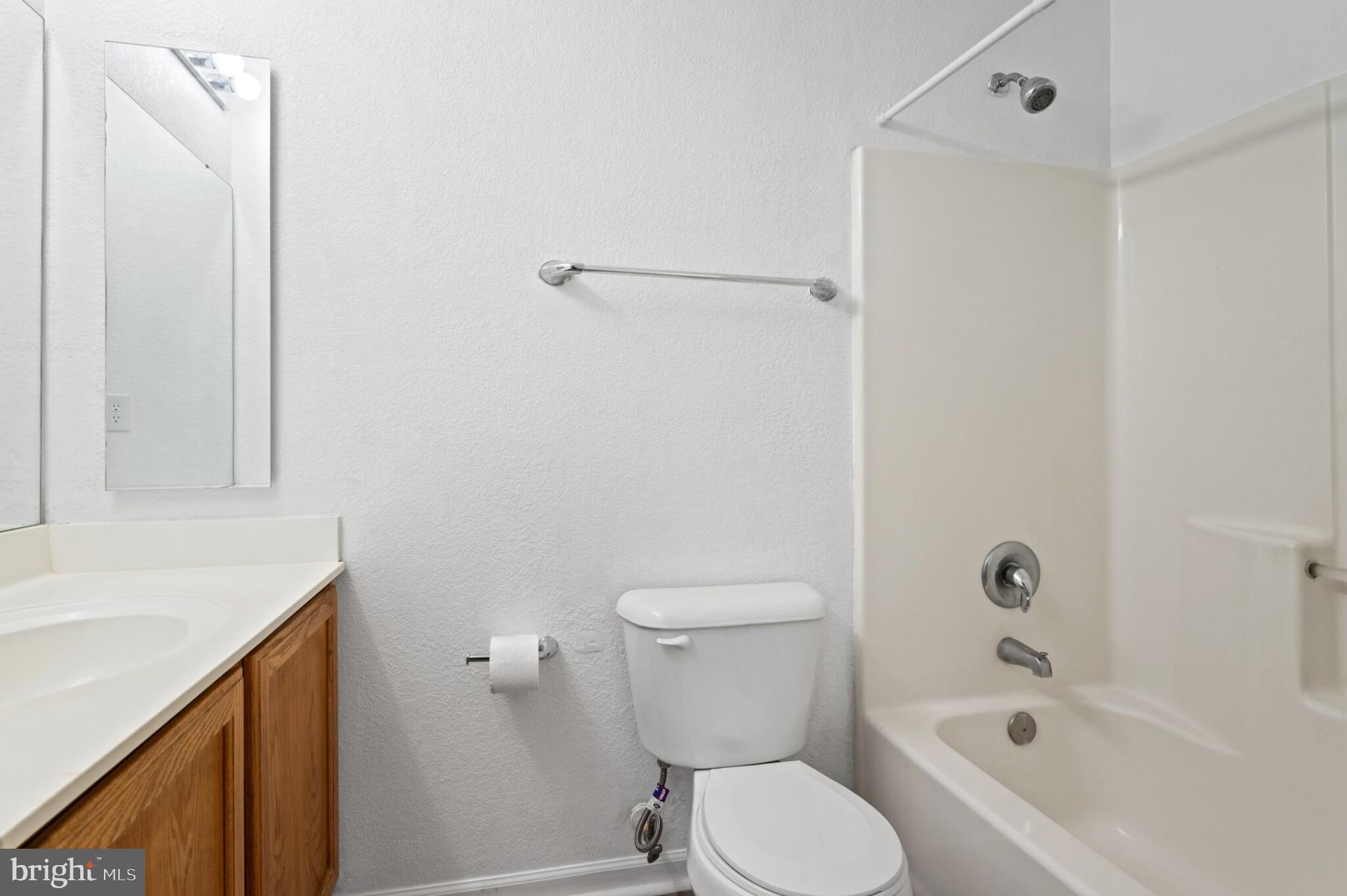 29 Pier Point Drive Millville, DE 19967 - Photo 25 of 36 a white toilet sitting next to a bath tub