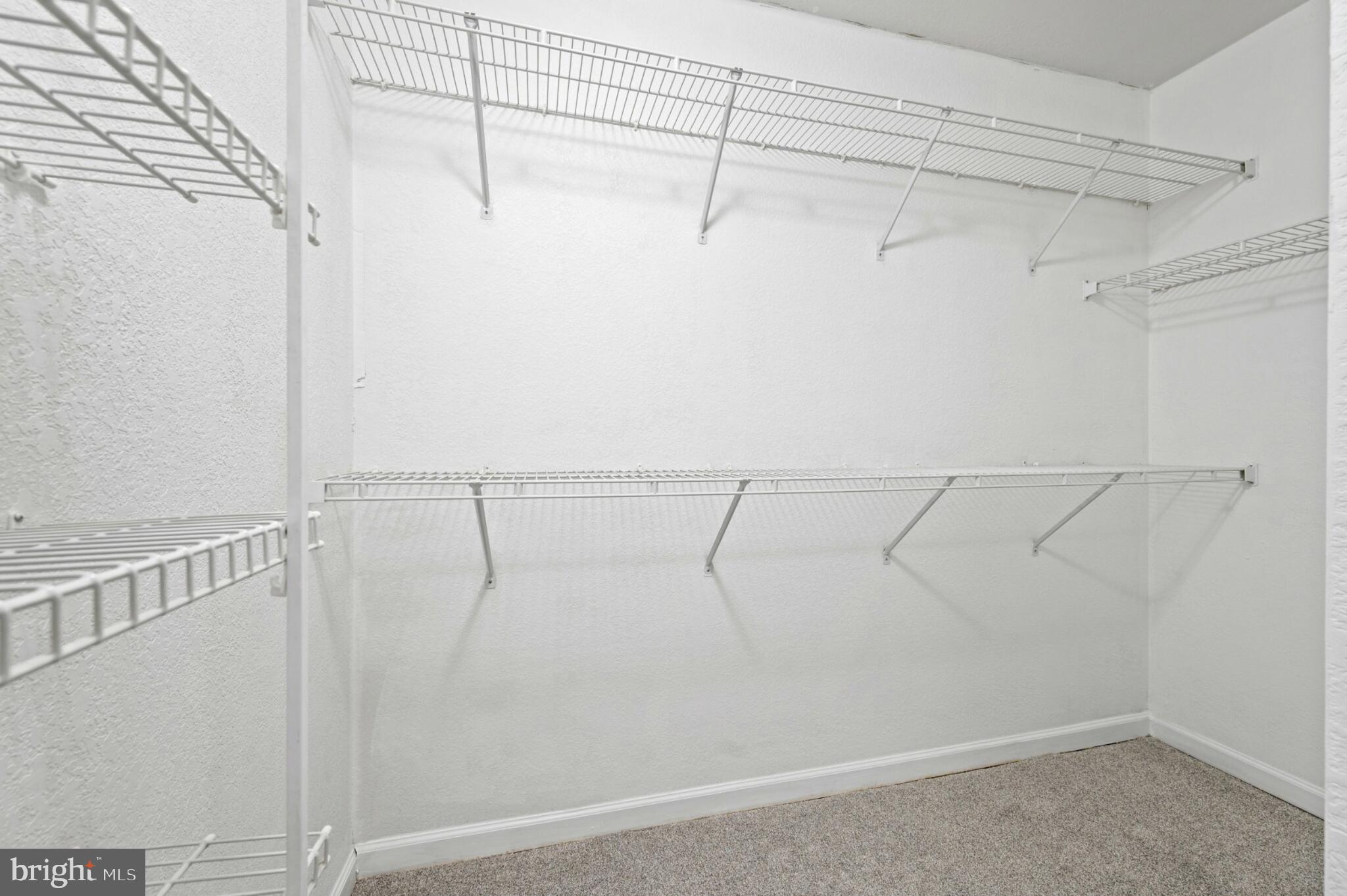 29 Pier Point Drive Millville, DE 19967 - Photo 30 of 36 a view of a room with racks on the wall