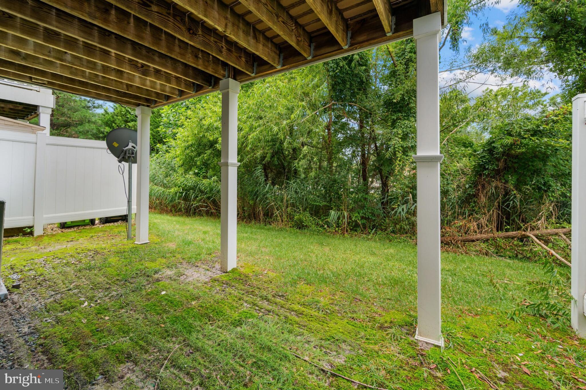 29 Pier Point Drive Millville, DE 19967 - Photo 3 of 36 a view of a backyard