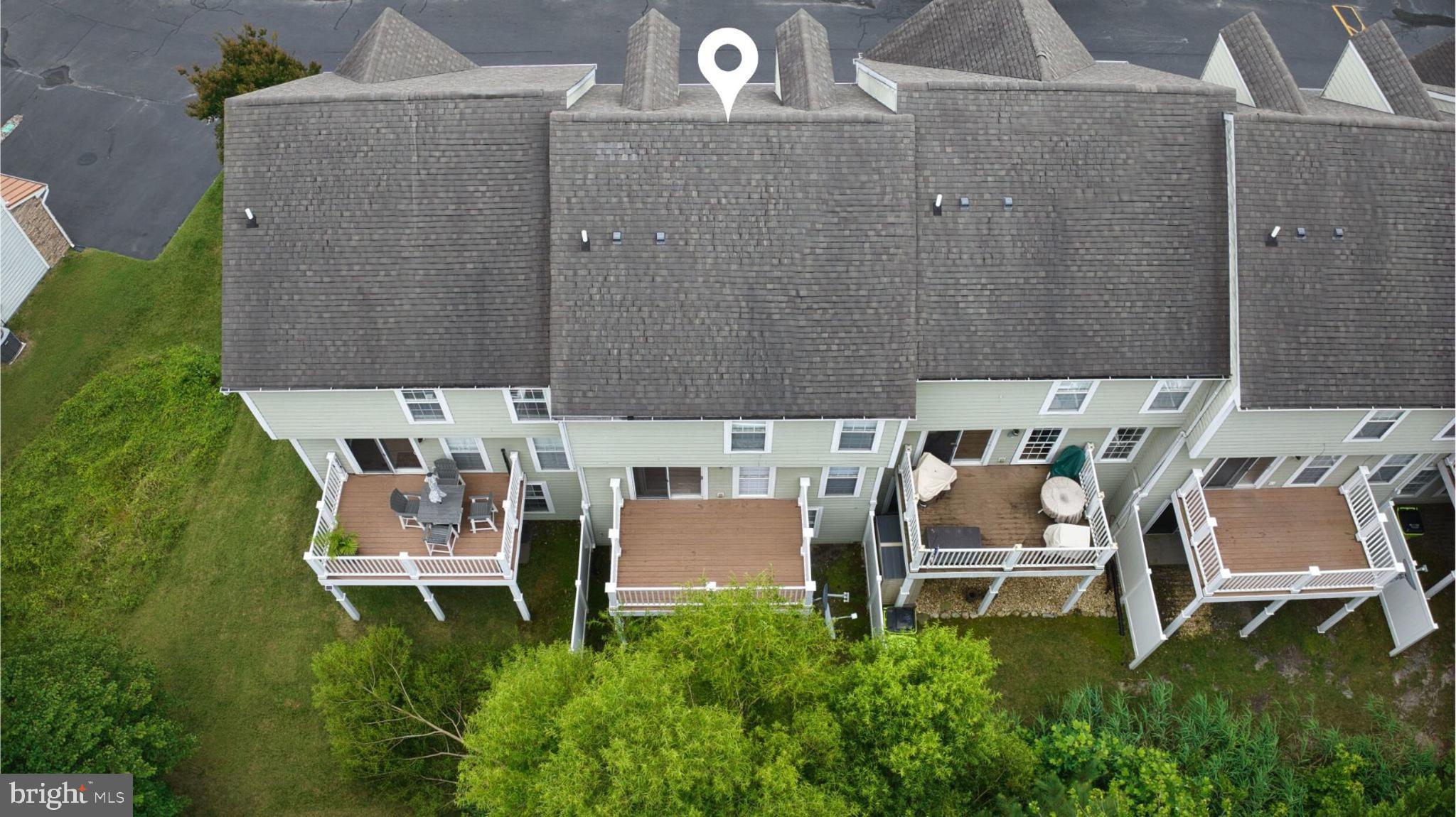 29 Pier Point Drive Millville, DE 19967 - Photo 34 of 36 a balcony with chairs and table