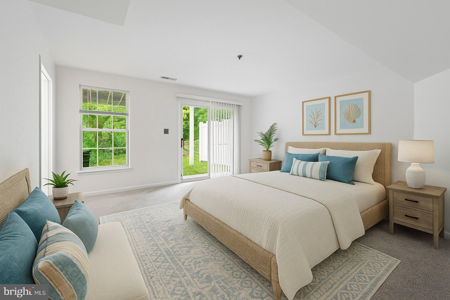 29 Pier Point Drive Millville, DE 19967 - Photo 10 of 36 a spacious bedroom with a bed couch and a window