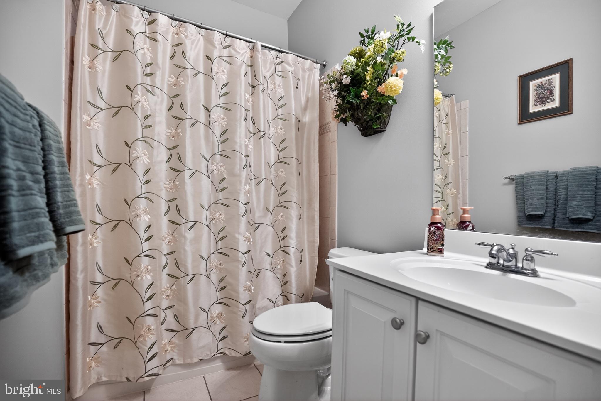 9 Simpkins Lane Pemberton, NJ 08068 - Photo 31 of 36 Charming bathroom with floral accents.