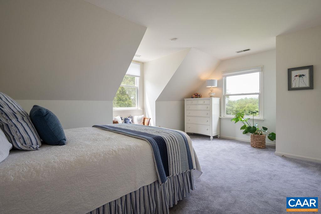 2903 Pea Ridge Road Charlottesville, VA 22901 - Photo 21 of 37 a bedroom with a bed and a window