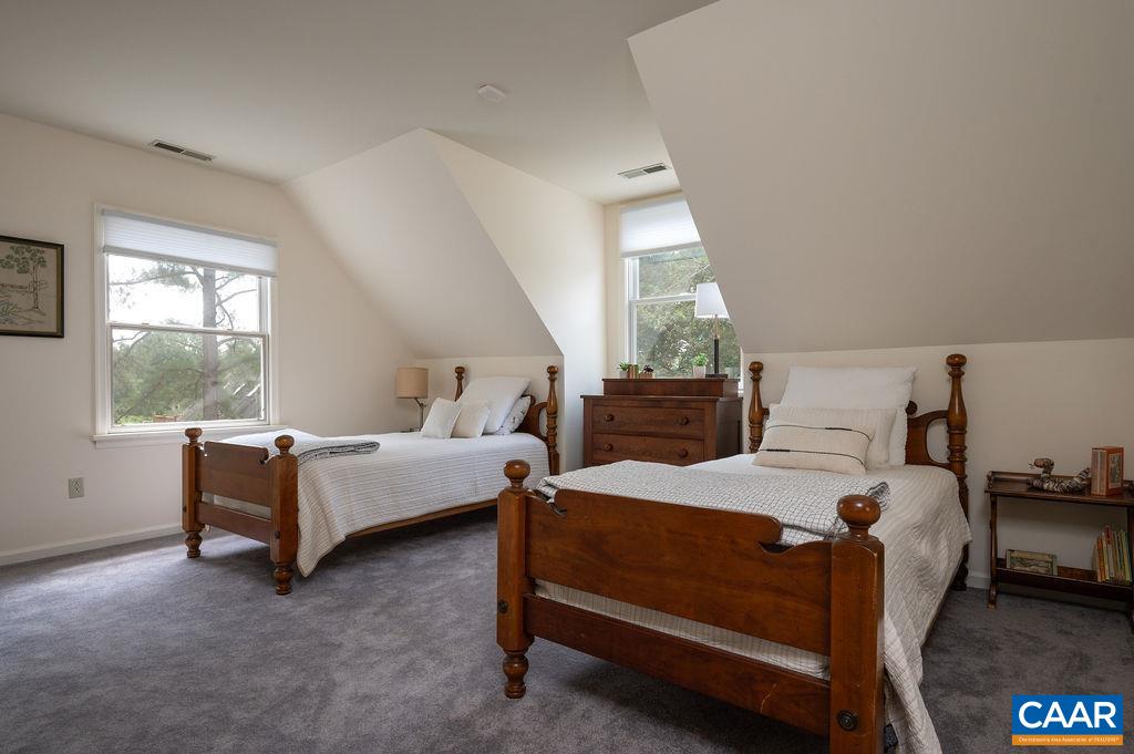 2903 Pea Ridge Road Charlottesville, VA 22901 - Photo 22 of 37 a bedroom with a bed and a window