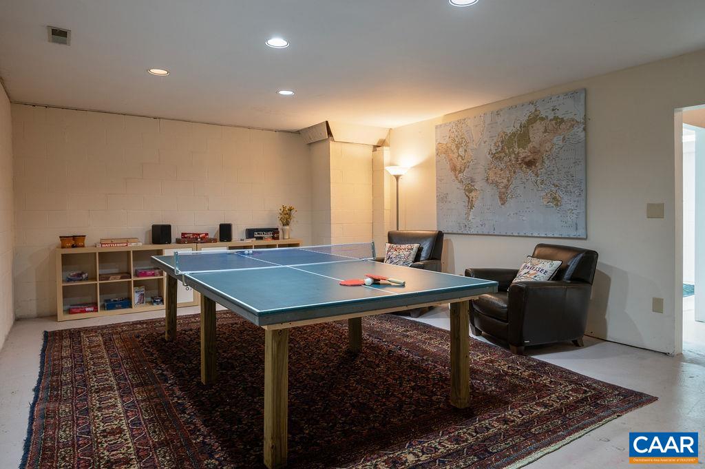 2903 Pea Ridge Road Charlottesville, VA 22901 - Photo 23 of 37 a living room with stainless steel appliances furniture rug and a rug