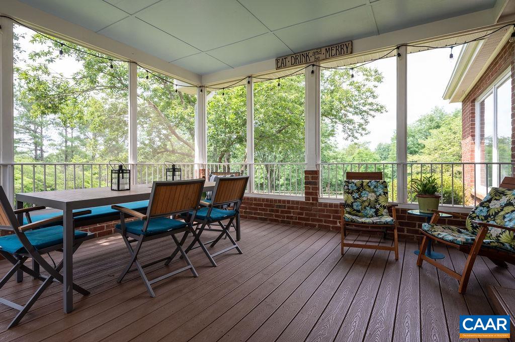 2903 Pea Ridge Road Charlottesville, VA 22901 - Photo 25 of 37 a view of a dining room with furniture and wooden floor