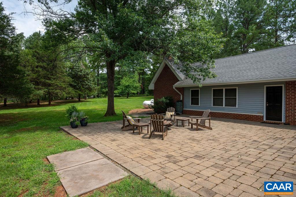 2903 Pea Ridge Road Charlottesville, VA 22901 - Photo 27 of 37 a view of a house with backyard sitting area and garden