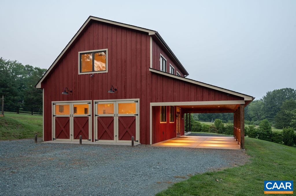 2903 Pea Ridge Road Charlottesville, VA 22901 - Photo 30 of 37 a front view of house with yard and garage