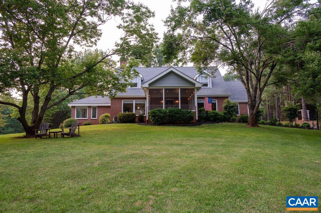 2903 Pea Ridge Road Charlottesville, VA 22901 - Photo 3 of 37 a front view of a house with a garden