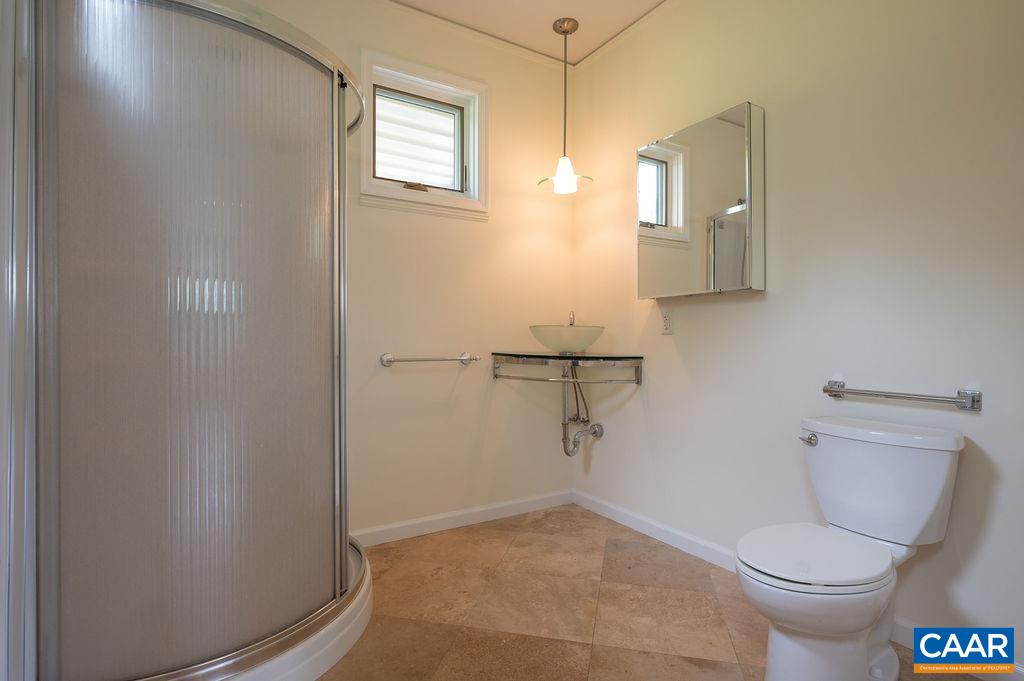 2903 Pea Ridge Road Charlottesville, VA 22901 - Photo 33 of 37 a bathroom with a toilet and a shower