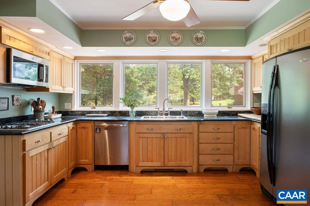 2903 Pea Ridge Road Charlottesville, VA 22901 - Photo 10 of 37 a kitchen with stainless steel appliances granite countertop a stove a sink and a refrigerator
