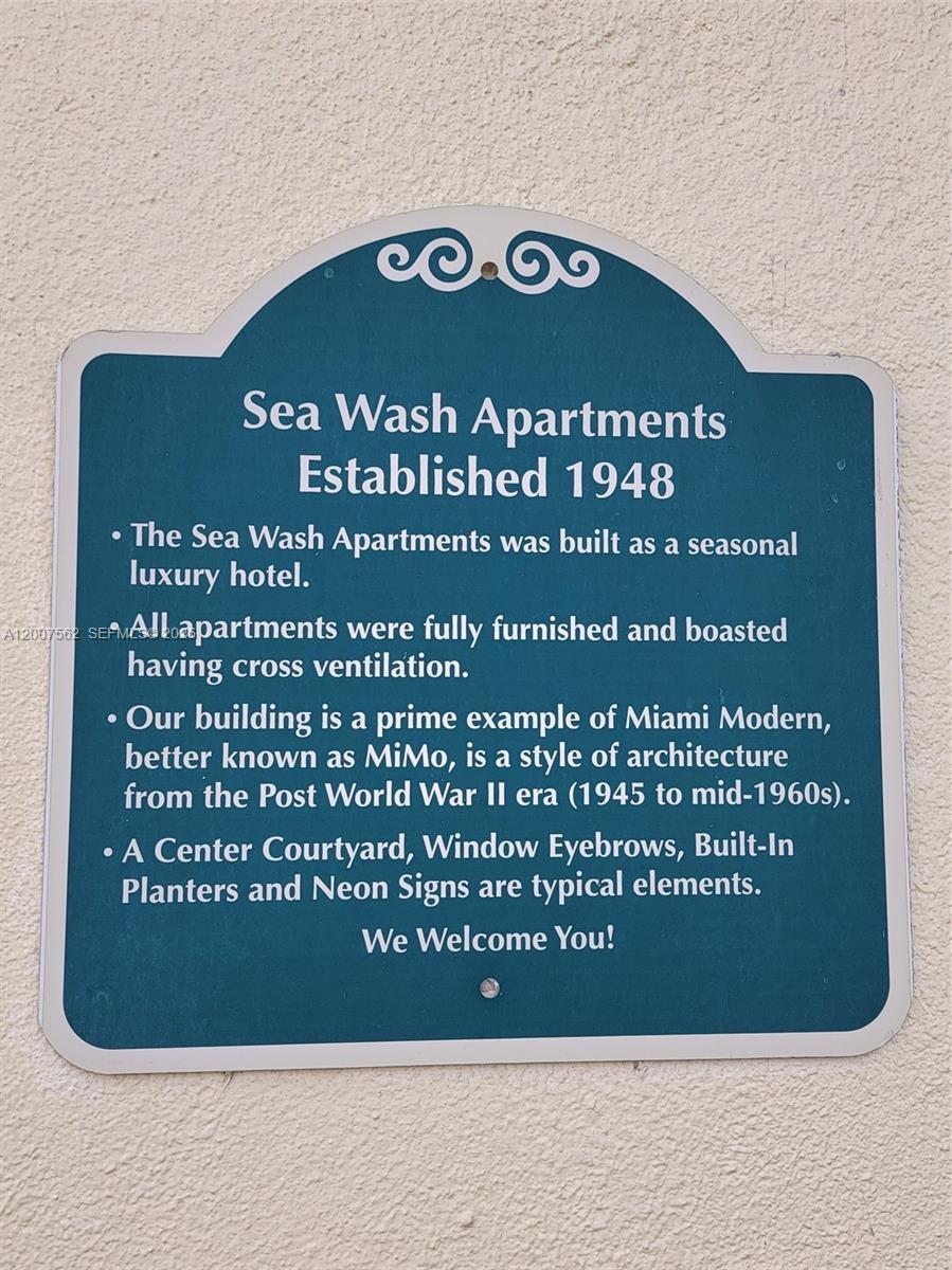 7400 Harding Avenue, Unit 15 Miami Beach, FL 33141 - Photo 10 of 26 a sign on the side of a building
