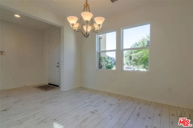 a view of a livingroom with a chandelier