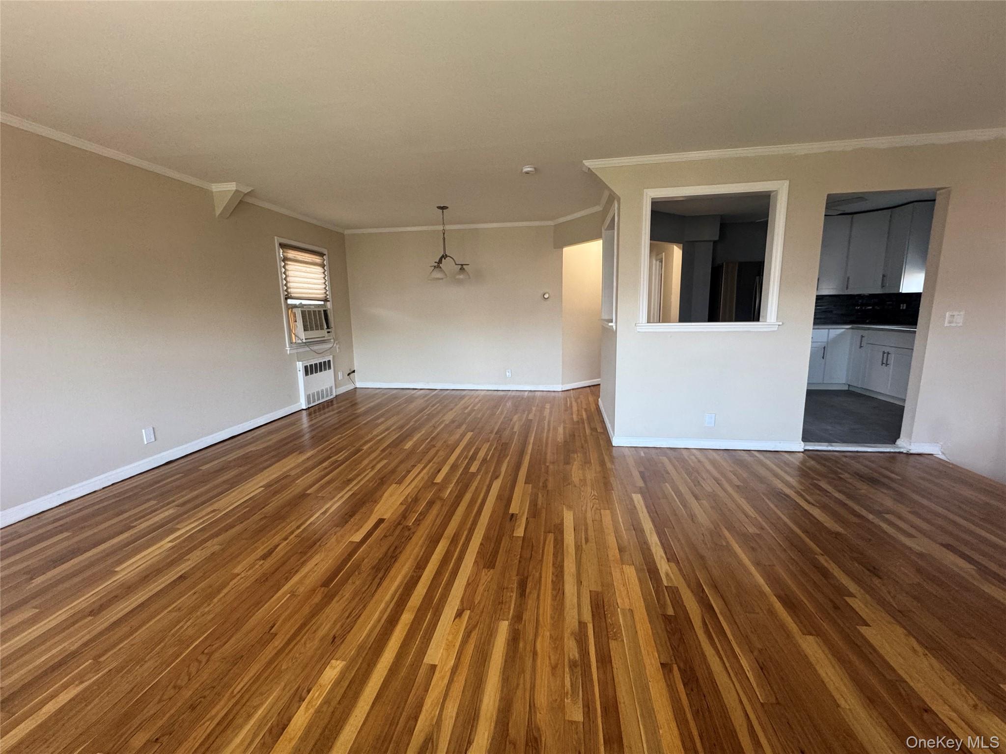 375 Cochran Place, Unit 2 Valley Stream, NY 11581 - Photo 1 of 12 a view of a room with wooden floor and staircase