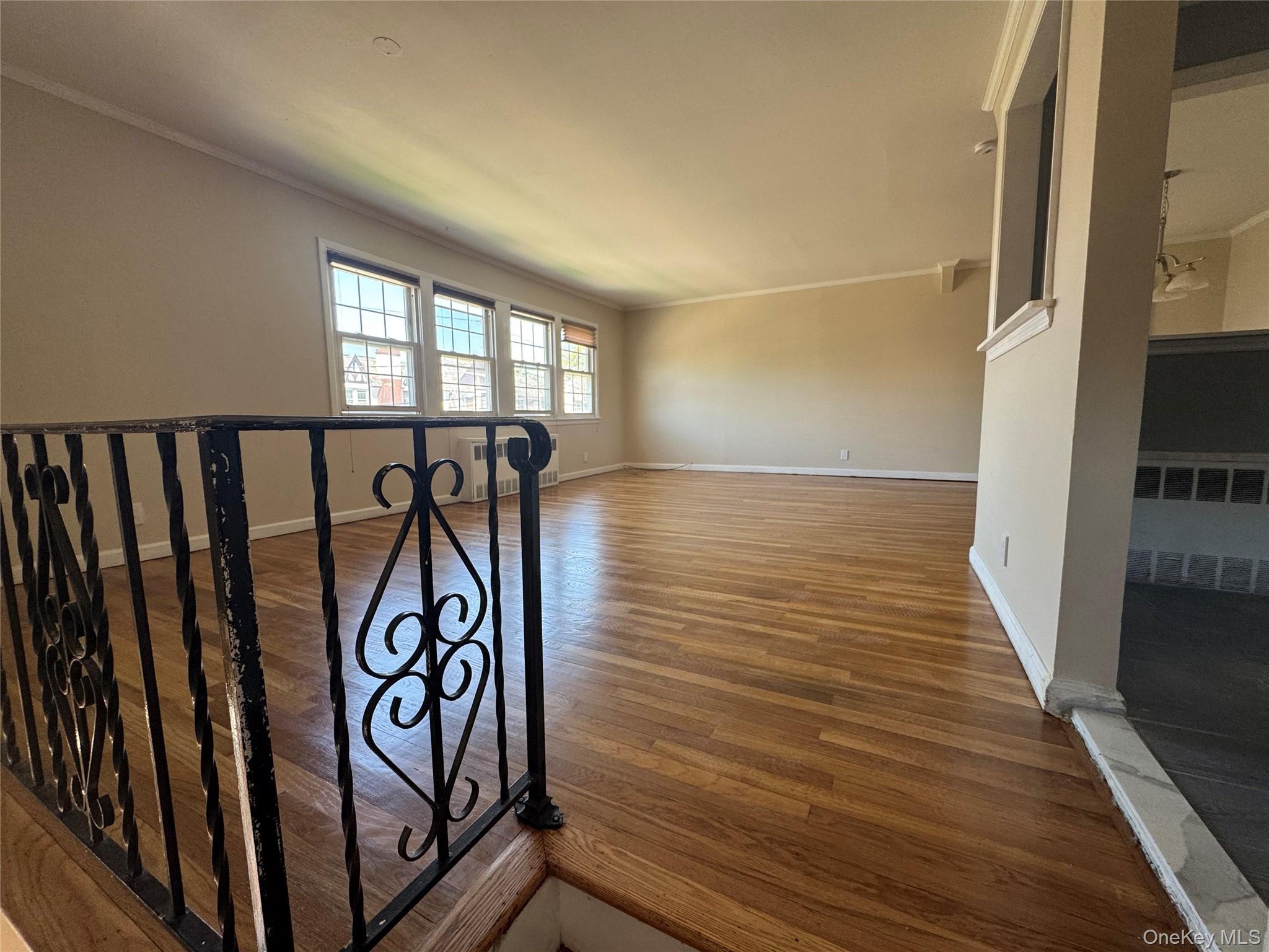 375 Cochran Place, Unit 2 Valley Stream, NY 11581 - Photo 3 of 12 a view of a room with wooden floor