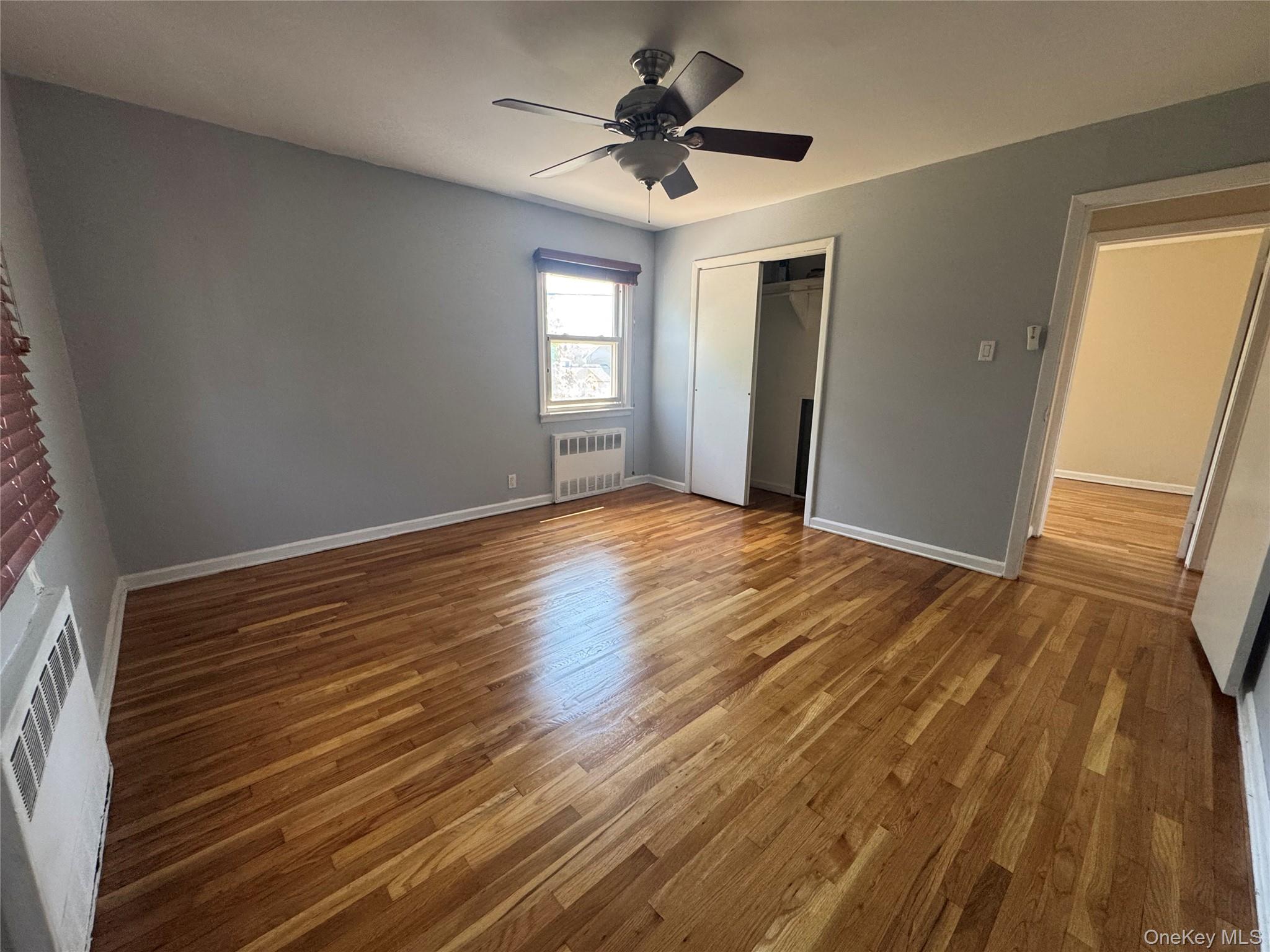 375 Cochran Place, Unit 2 Valley Stream, NY 11581 - Photo 8 of 12 a view of an empty room with a window