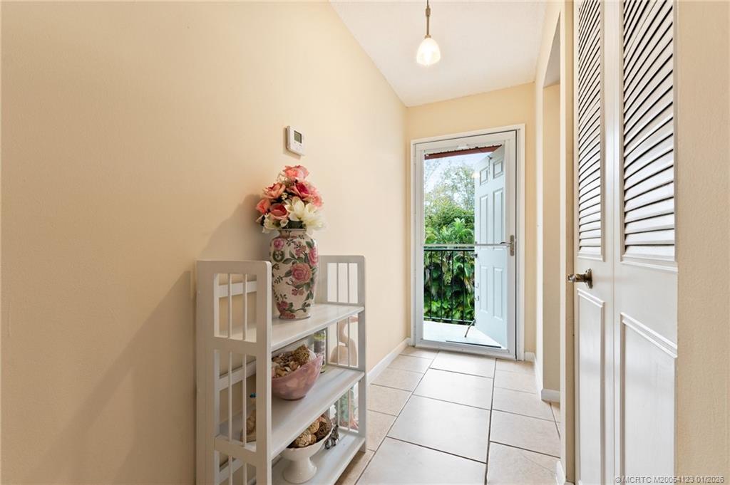 1980 Southwest Palm City Road, Unit 50J Stuart, FL 34994 - Photo 4 of 37 a view of an entryway with workspace