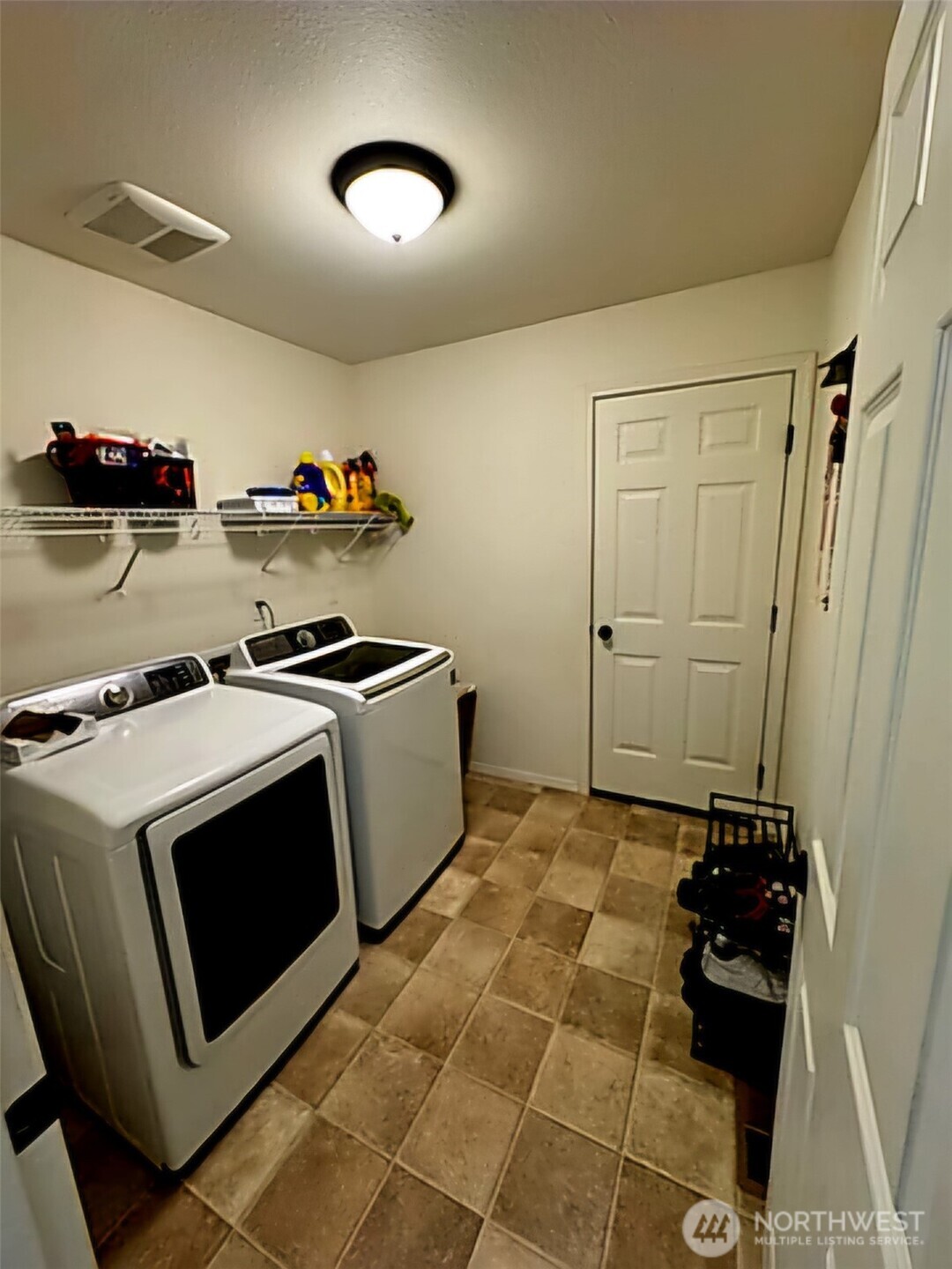 85 Linda Ridge Loop Ephrata, WA 98823 - Photo 5 of 9 a utility room with sink dryer and washer