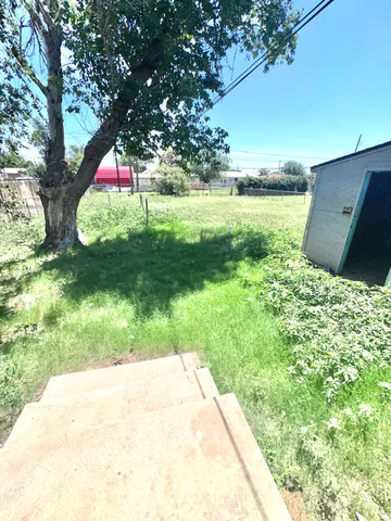 a view of an outdoor space and a yard