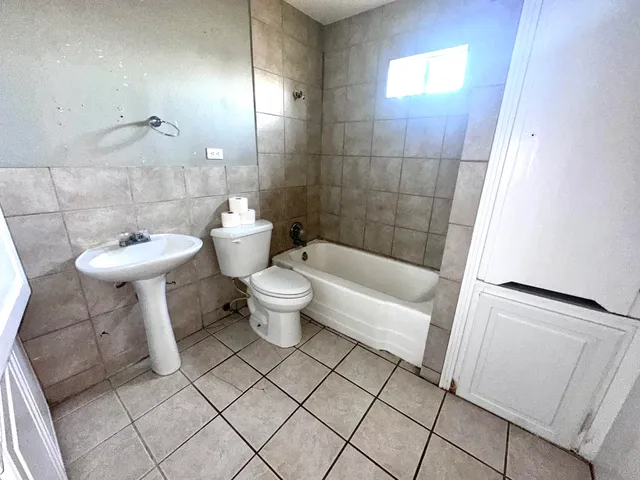 a bathroom with a sink and a toilet