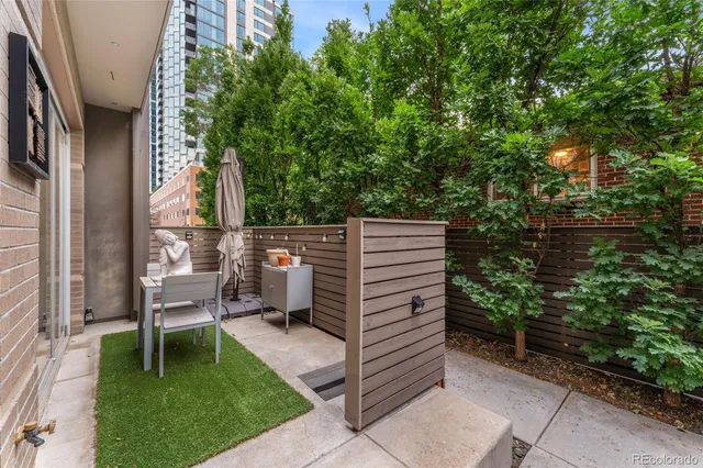a view of a patio in backyard
