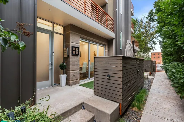 a bathroom with a shower and a door