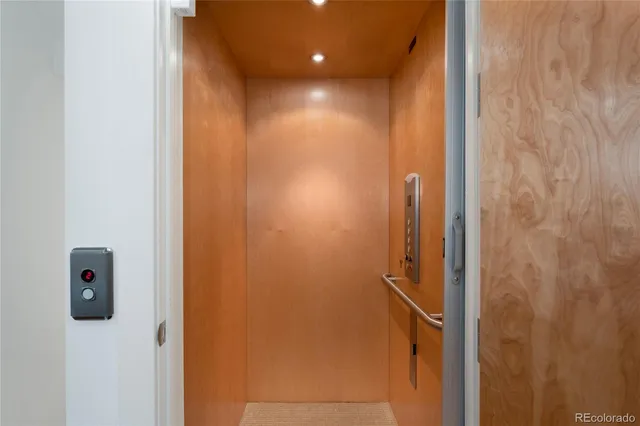a view of a livingroom with furniture and wooden floor