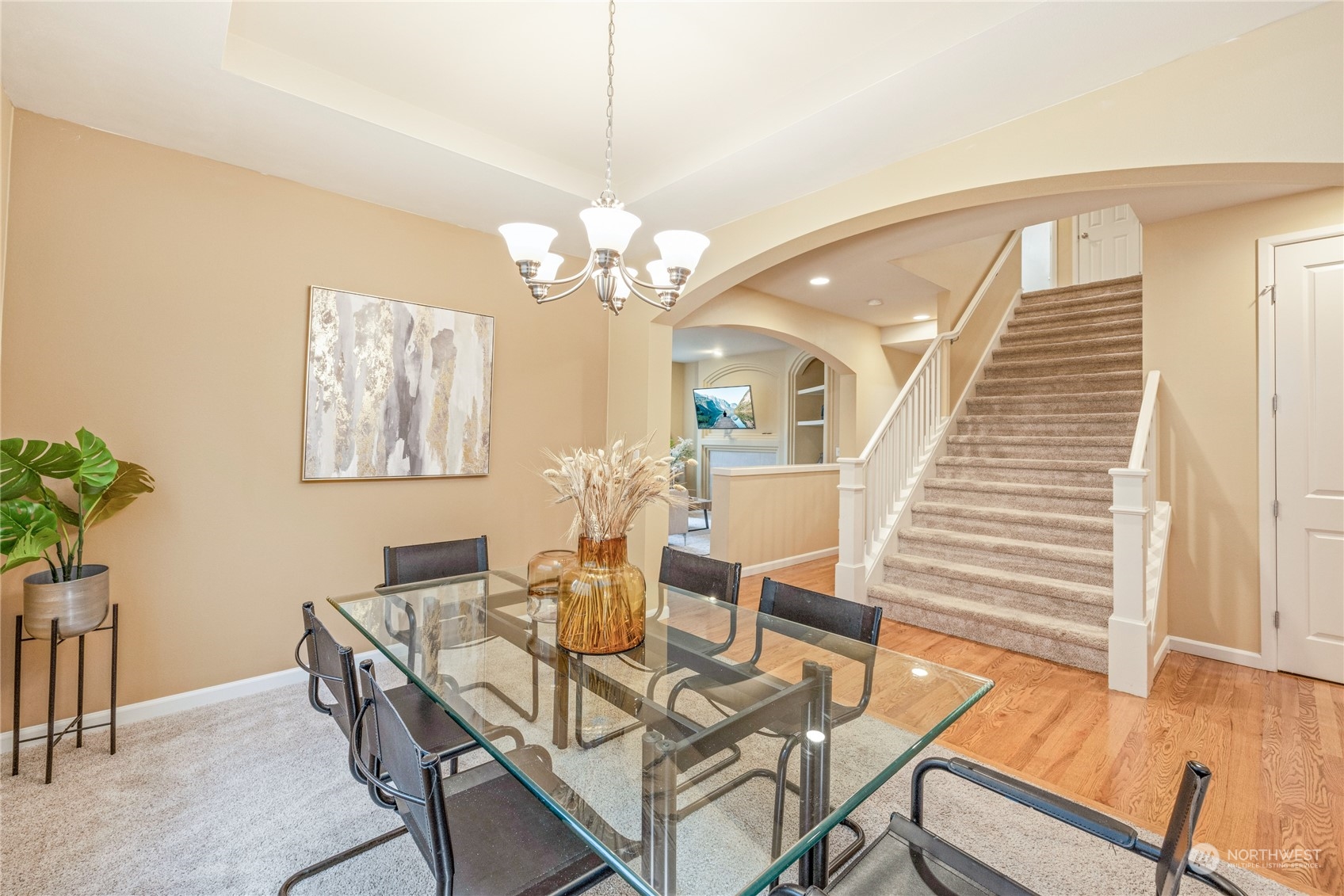 16106 Parkside Way Southeast Renton, WA 98058 - Photo 8 of 40 a view of a dining room with furniture and wooden floor
