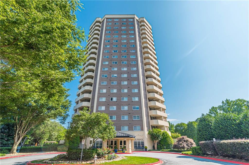 1501 Clairmont Road, Unit 224 Decatur, GA 30033 - Photo 1 of 1 a view of a tall building next to a road