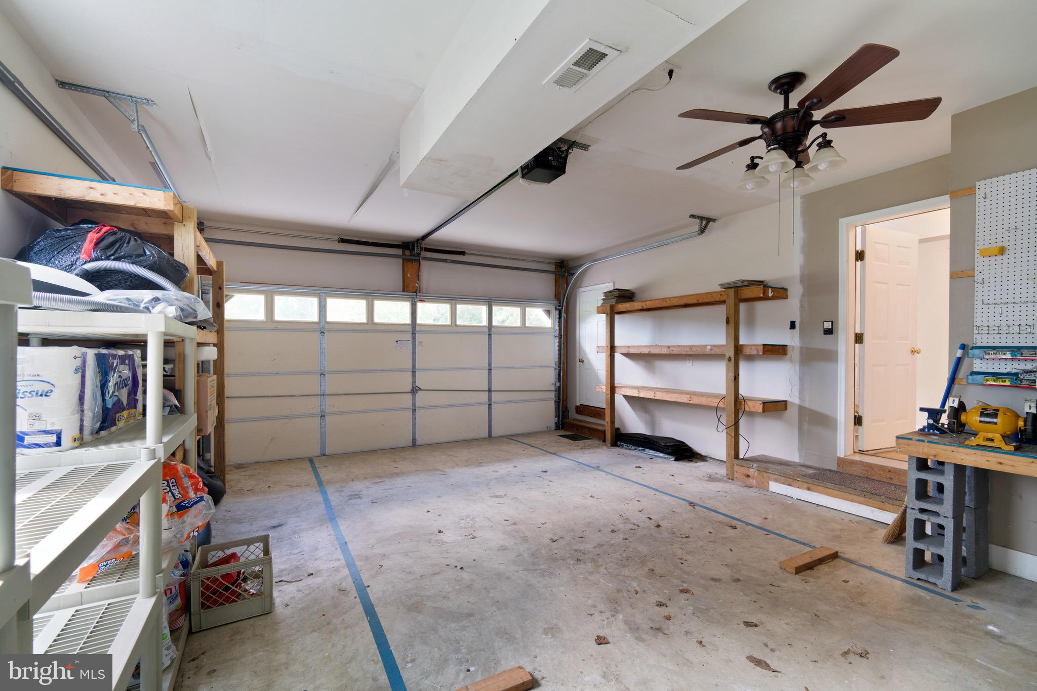 153 Allegany Road Stevensville, MD 21666 - Photo 25 of 46 Two car garage with additional storage