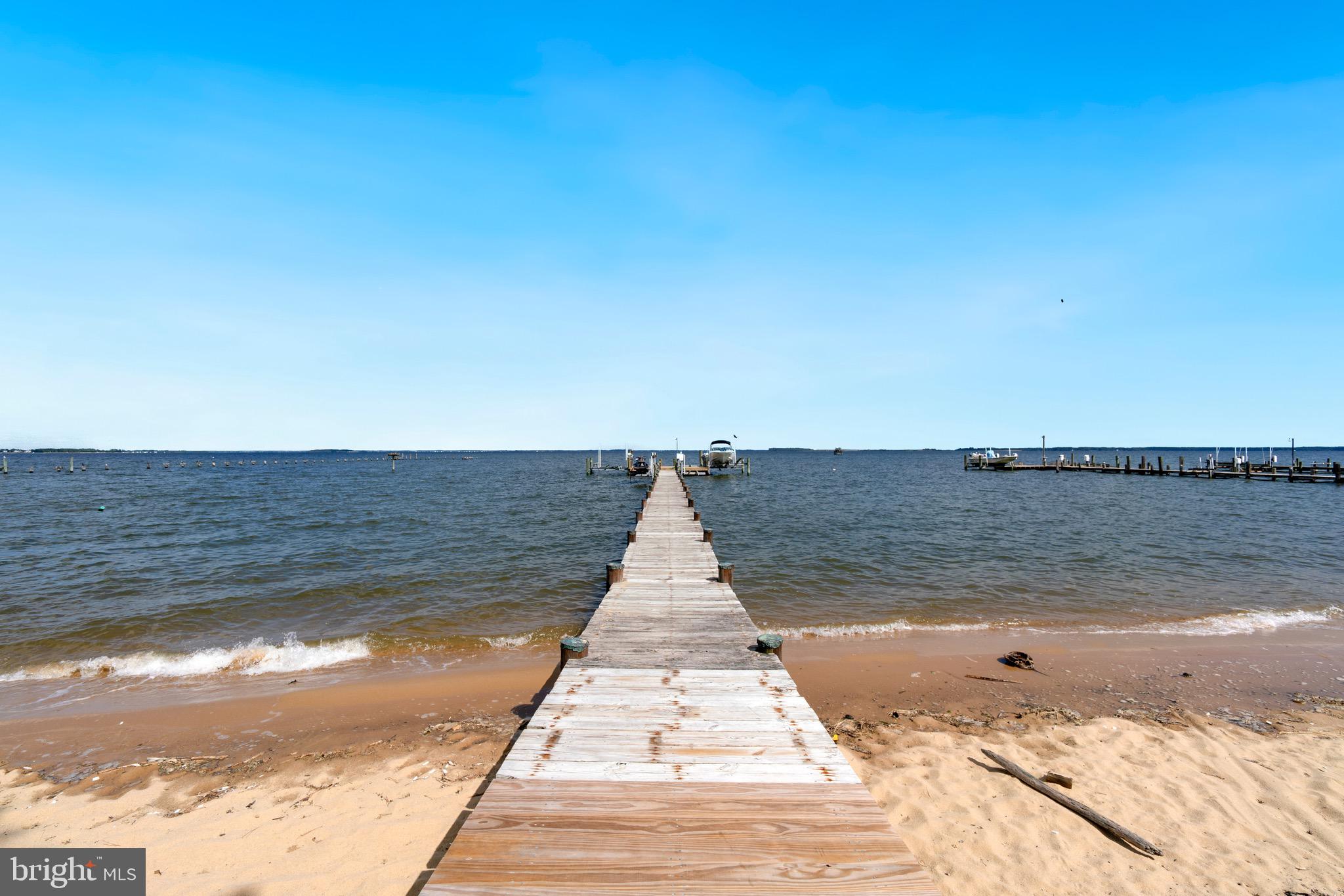 153 Allegany Road Stevensville, MD 21666 - Photo 27 of 46 Pier with sandy beach