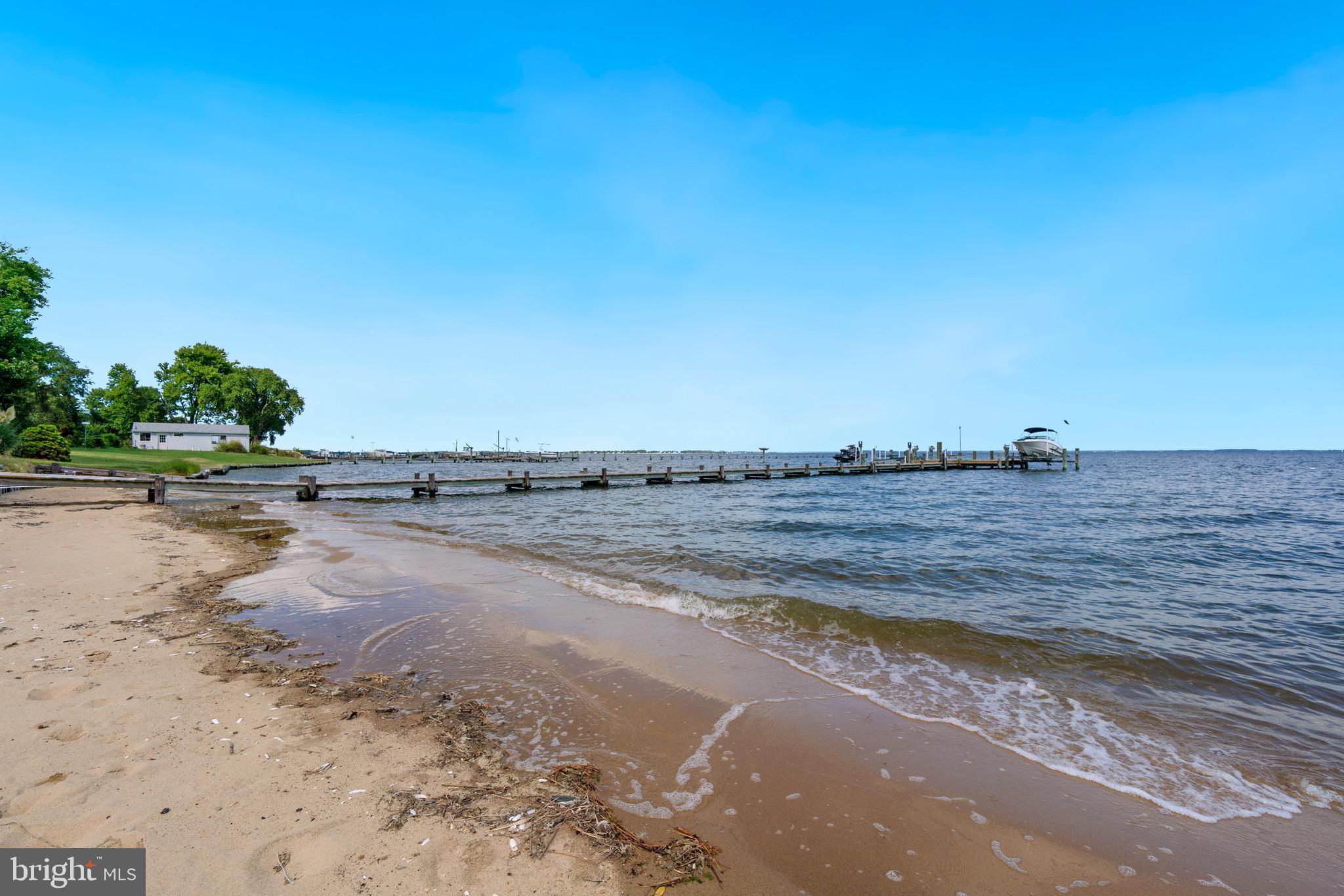 153 Allegany Road Stevensville, MD 21666 - Photo 28 of 46 Sandy beach is perfect for launching kayaks