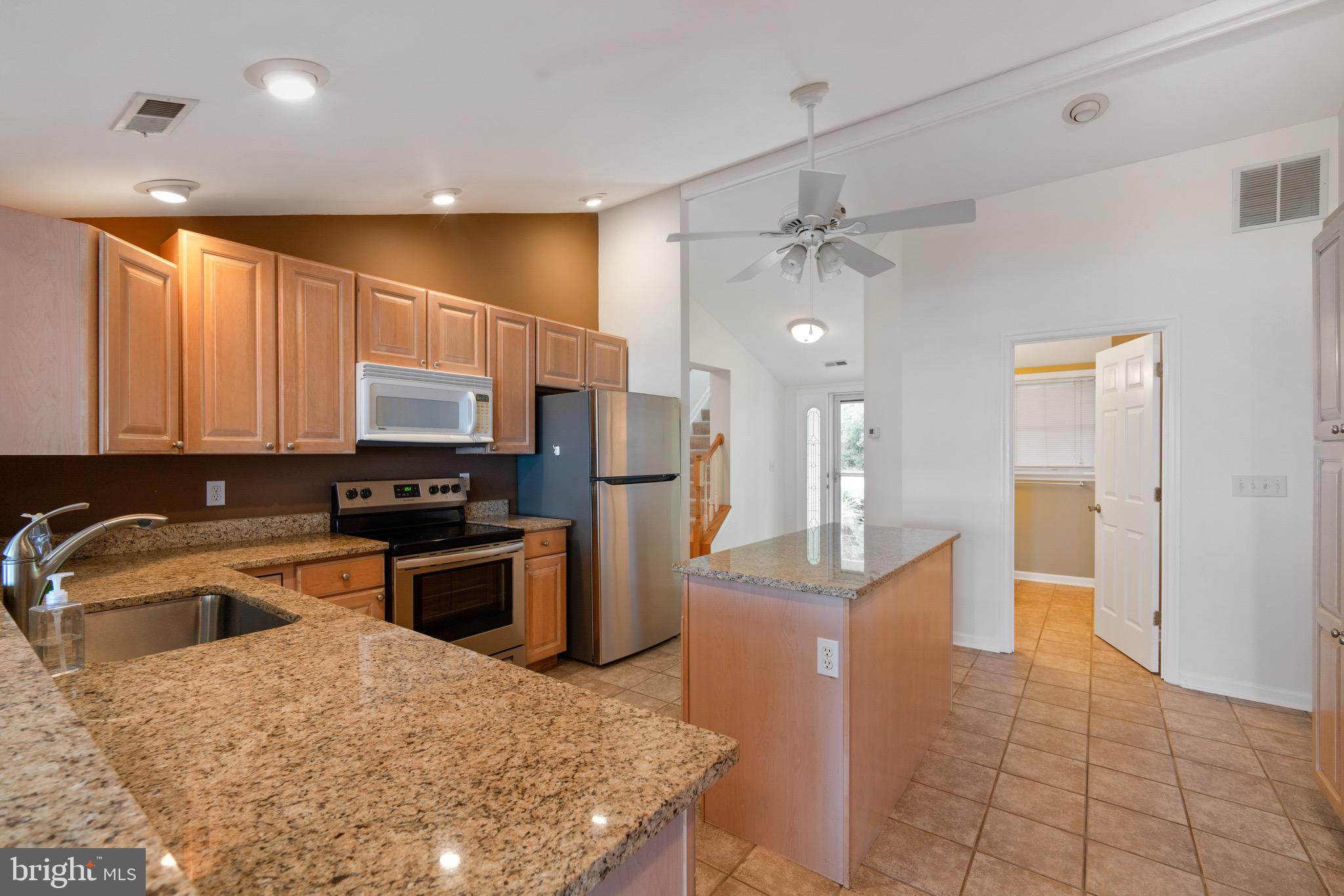 153 Allegany Road Stevensville, MD 21666 - Photo 9 of 46 Kitchen with vaulted ceiling