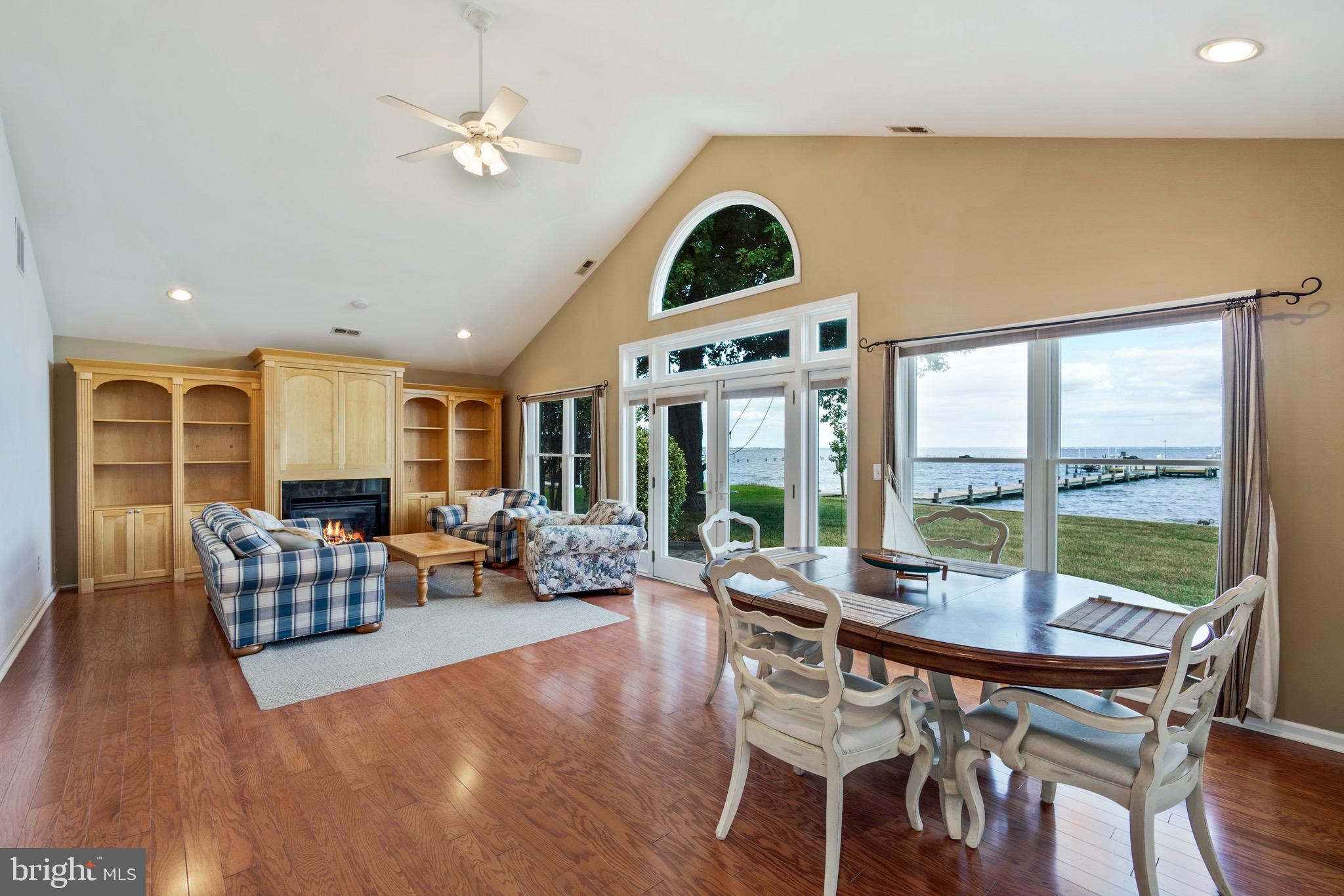 153 Allegany Road Stevensville, MD 21666 - Photo 10 of 46 Great room with cathedral ceilings, hardwood floor