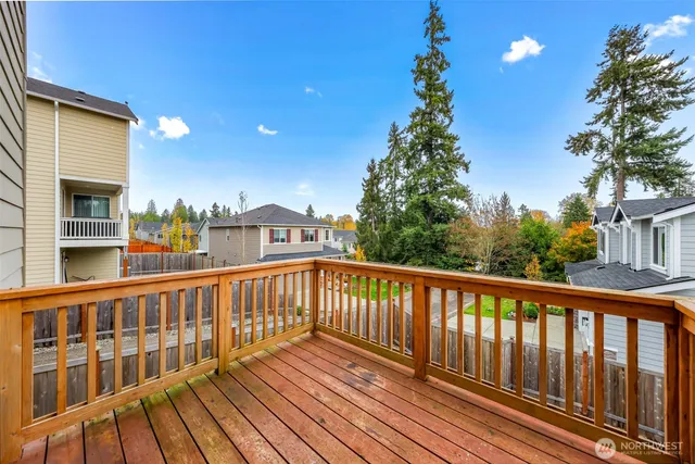 a view of a houses from a balcony