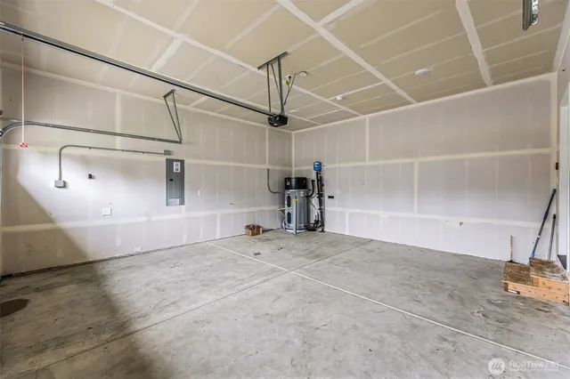 a view of a garage with wooden floor