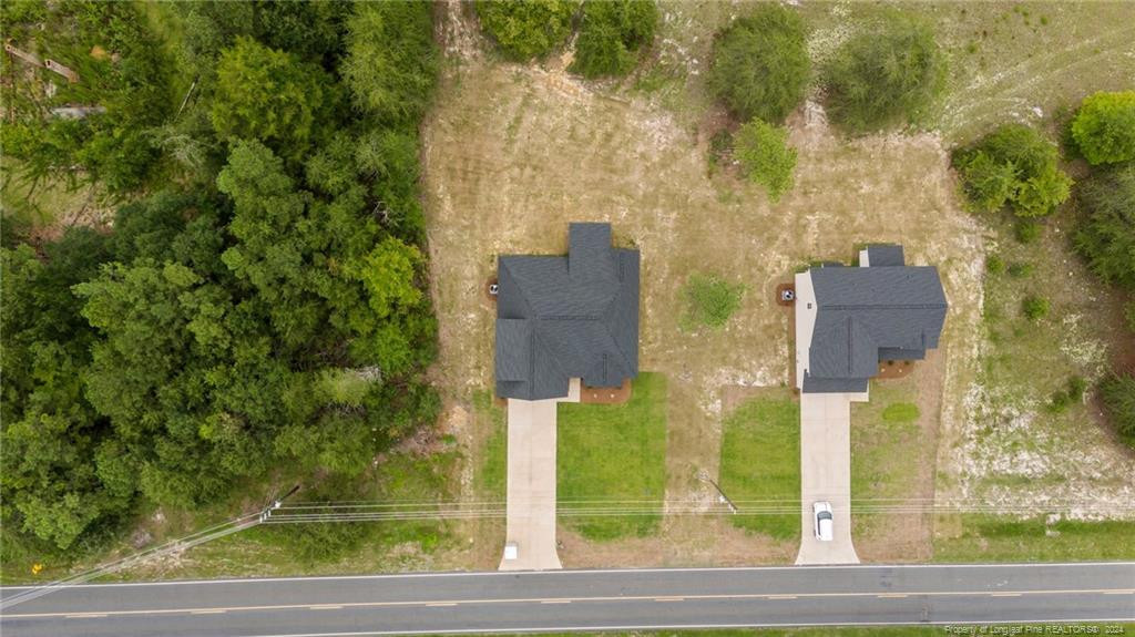 2902 Calloway (lot 1) Road Rockingham, NC 28379 - Photo 8 of 44 an aerial view of a residential houses with yard