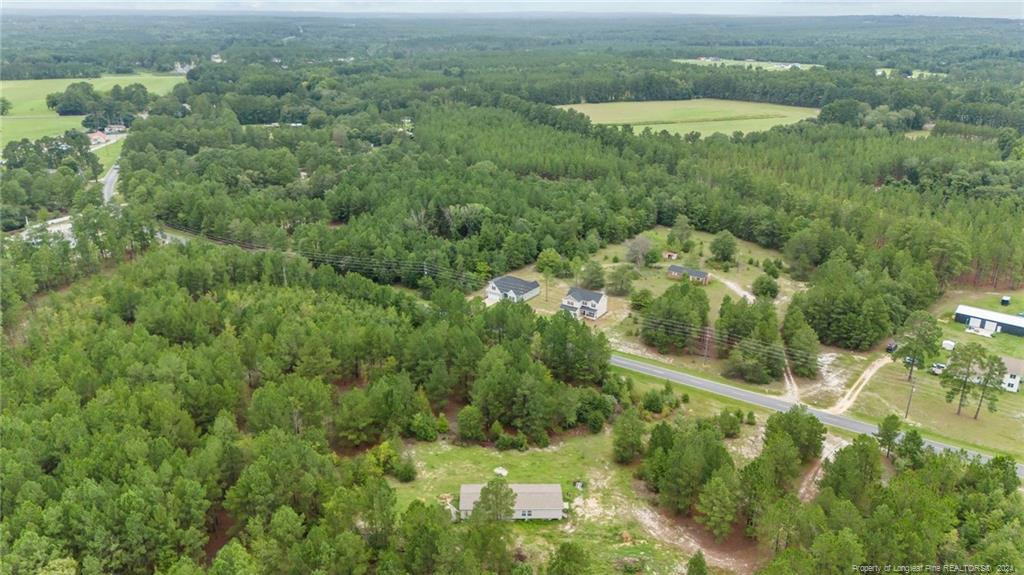 2902 Calloway (lot 1) Road Rockingham, NC 28379 - Photo 10 of 44 an aerial view of residential houses with outdoor space and trees
