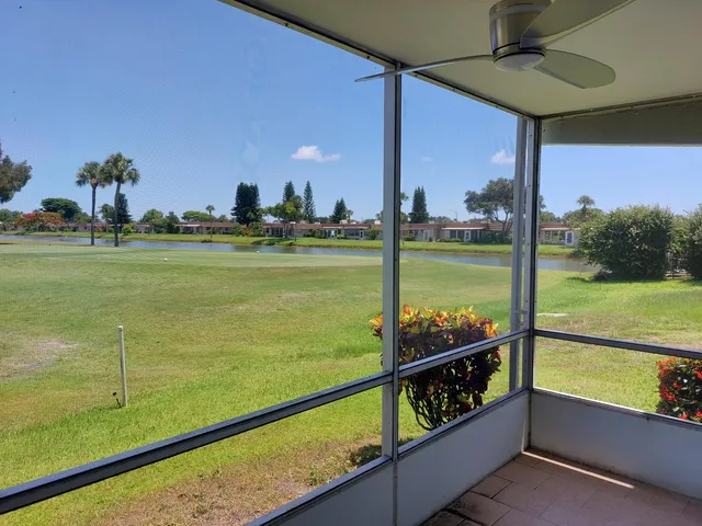 a view of swimming pool from a balcony