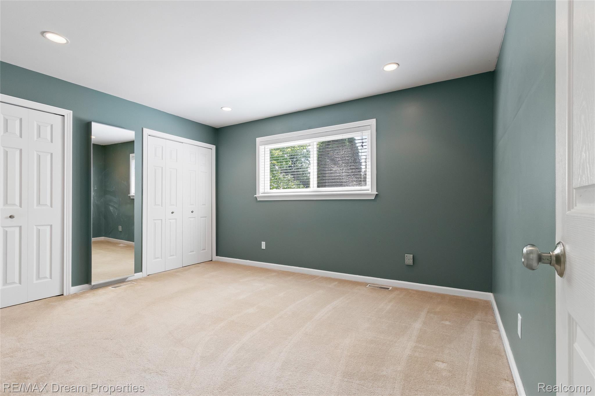 42747 Saxony Road Canton, MI 48187 - Photo 16 of 28 Master Bedroom with lots of storage, recessed lighting