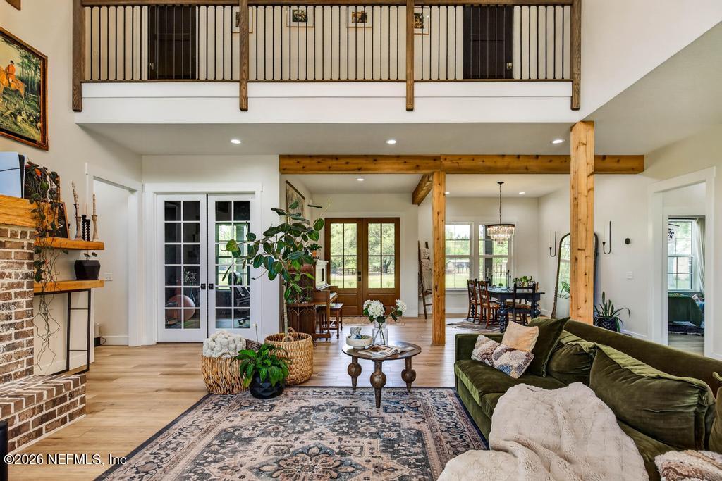 2955 Carroll Corner Road Hilliard, FL 32046 - Photo 24 of 106 a living room with furniture and a potted plant