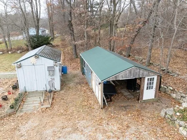 a view of living room with furniture and a chandelier